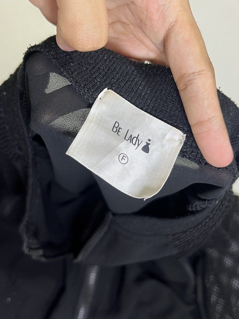 Be Lady Black Mesh Sleeve Zip Bomber Jacket (Category: Coats, Jackets and Outerwear) located in Manila. Submitted by sennisen (Listing ID 1464922834, Image 2). Description: - Brand: Be Lady - Size: F (Free Size) - Color: Black - Style: Lightweight casual bomber jacket - Material/Design: Sheer body fabric with textured mesh sleeves - Features: Full front zip closure, two zipped side pockets, and ribbed knit collar, cuffs, and hem.