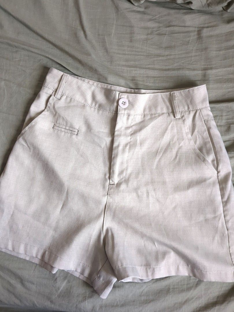 Beige / gray tailored shorts with back pockets (Category: Shorts) located in Manila. Submitted by chocolateparfait (Listing ID 1464797731, Image 1). Description: High-waisted shorts Waist - 26-27 inches Length - 14.5 inches.