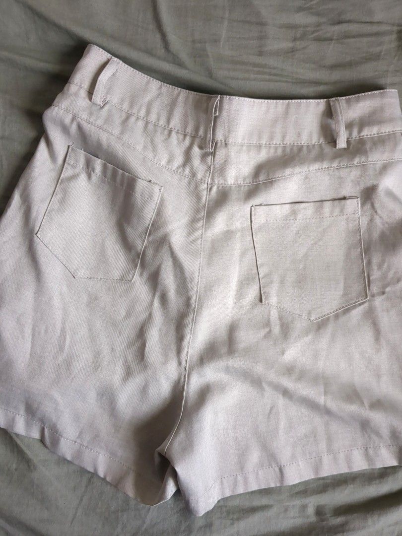 Beige / gray tailored shorts with back pockets (Category: Shorts) located in Manila. Submitted by chocolateparfait (Listing ID 1464797731, Image 3). Description: High-waisted shorts Waist - 26-27 inches Length - 14.5 inches.