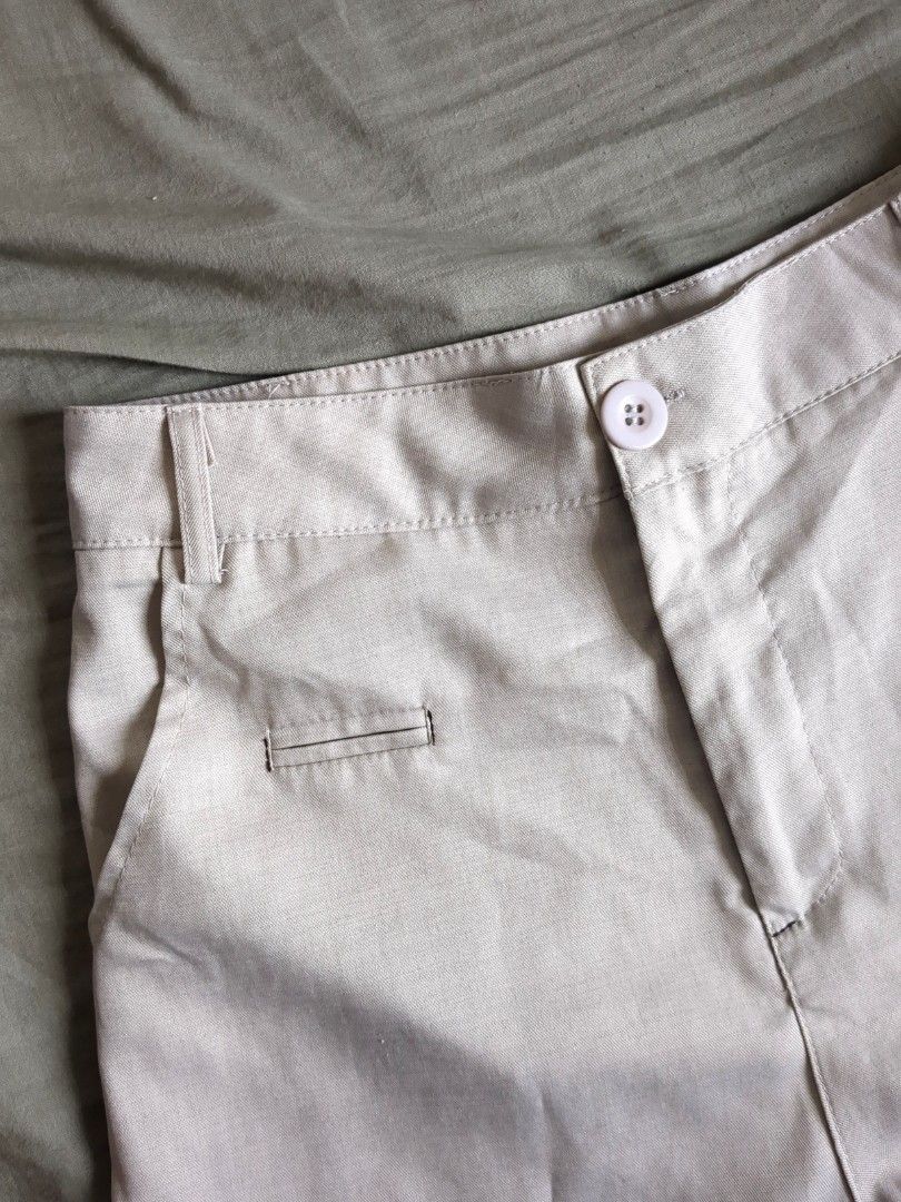 Beige / gray tailored shorts with back pockets (Category: Shorts) located in Manila. Submitted by chocolateparfait (Listing ID 1464797731, Image 2). Description: High-waisted shorts Waist - 26-27 inches Length - 14.5 inches.