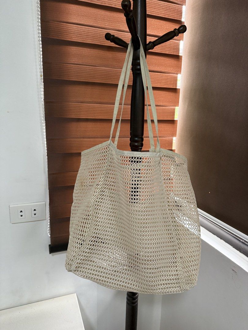 Beige Mesh Beach Tote Bag Shopper Handbag (Category: Tote Bags) located in Imus. Submitted by neirasalonga_ (Listing ID 1464790423, Image 2). Description: FREE if you buy at least ₱1,500 worth of my listing. RFS: Decluttering 📍Imus, Cavite DELIVERY: via lalamove/grab. delivery fee shouldered by buyer..
