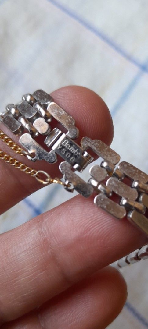 Bemb Y506 Metal Watch Bracelet Strap (Category: Luxury Watches) located in Bocaue. Submitted by marajapansurplus (Listing ID 1464780464, Image 3). Description: - Selling as it is - model Y506 watch strap - Sleek silver-tone multi-link design - Features a secure clasp stamped with brand and model number - Includes attached safety chain for extra security - Clean links, ready to attach to a compatible watch case.