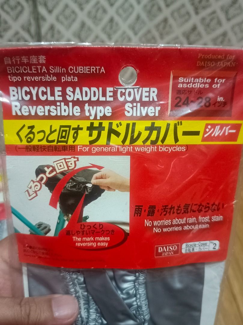 Bicycle Saddle Cover (Category: Bicycles) located in Makati City. Submitted by nyxhemera26 (Listing ID 1464872838, Image 3). Description: Bicycle Saddle Cover - Brand: Daiso Japan (Guaranteed Authentic) - Condition: Brand new, sealed in original packaging - Fit: Suitable for 24 to 28-inch bicycle saddles - Feature: Reversible silver design - Protection: Shields against rain, frost, and dust - Usage: Simply rotate before and after riding to keep y