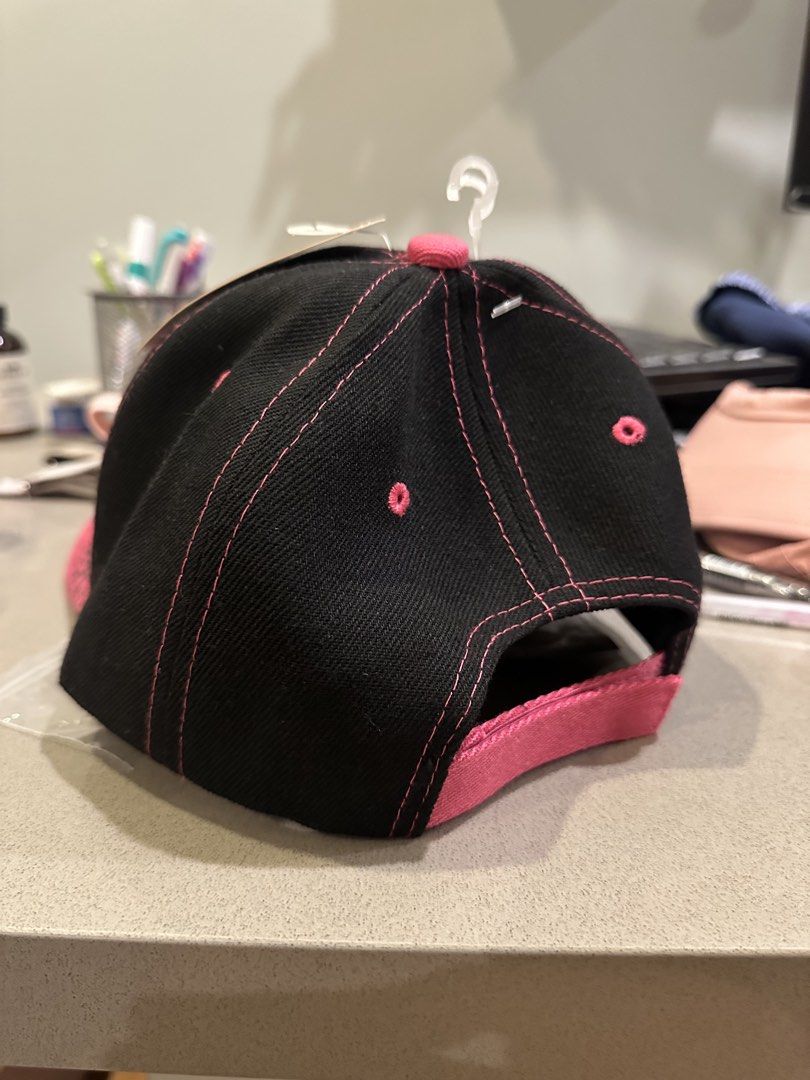 Black & Pink NY Embroidered Baseball Cap (Category: Caps & Hats) located in Makati City. Submitted by kobeskorner (Listing ID 1464919700, Image 2). Description: Black & Pink NY Embroidered Cap 🩷🖤 Brand new with tag Black cap with hot pink leopard-print brim Adjustable back Never worn.