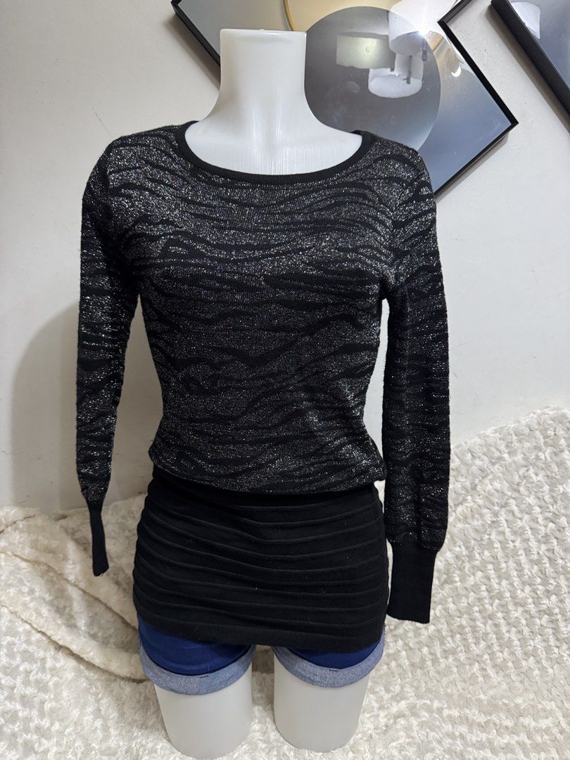 Black and Silver Shimmer Knit Sweater (Category: Coats, Jackets and Outerwear) located in Marikina City. Submitted by lorradel (Listing ID 1464836334, Image 1). Description: - fits S-M - Color: Sleek black with a subtle shimmering metallic pattern - Fit: Comfortable stretchy knit material with a round neckline - Design: Ribbed cuffs and an extended ribbed hem for a stylish layered look - Perfect for: Cooler weather, date nights, and evening outin
