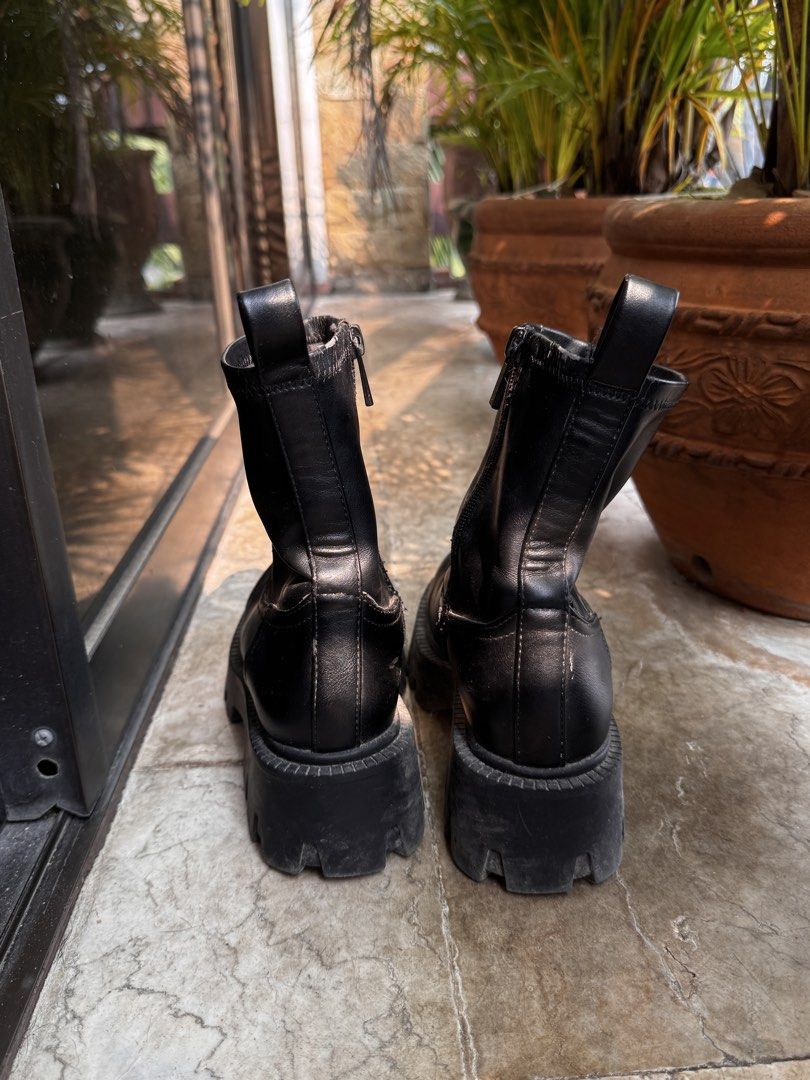 Black Chunky Lug Sole Platform Chelsea Boots (Category: Boots) located in Quezon City. Submitted by zzzchooeh (Listing ID 1464825245, Image 2). Description: - Style: Edgy streetwear black chunky platform boots - Height: Mid-calf with a comfortable chunky heel and thick lug soles - Fit & Comfort: Stretchy upper material and convenient side zipper for easy wear - Toe: Rounded toe shape - Condition: Worn a few times, minor wear on soles - Styling Ti