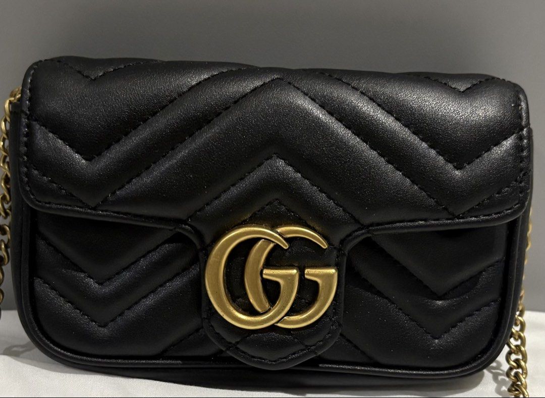 Black Gucci Marmont Super Mini (Category: Luxury Bags & Wallets) located in Makati City. Submitted by ziaspreloved (Listing ID 1464930781, Image 1). Description: No major flaws Good condition Price negotiable.