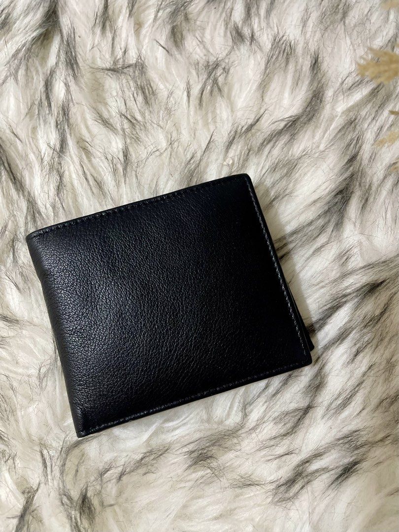 Black Leather Wallet for Men (Category: Wallets & Card Holders) located in Teresa. Submitted by savvyonbranded (Listing ID 1464878079, Image 1). Description: 4 x 4.5 inches.