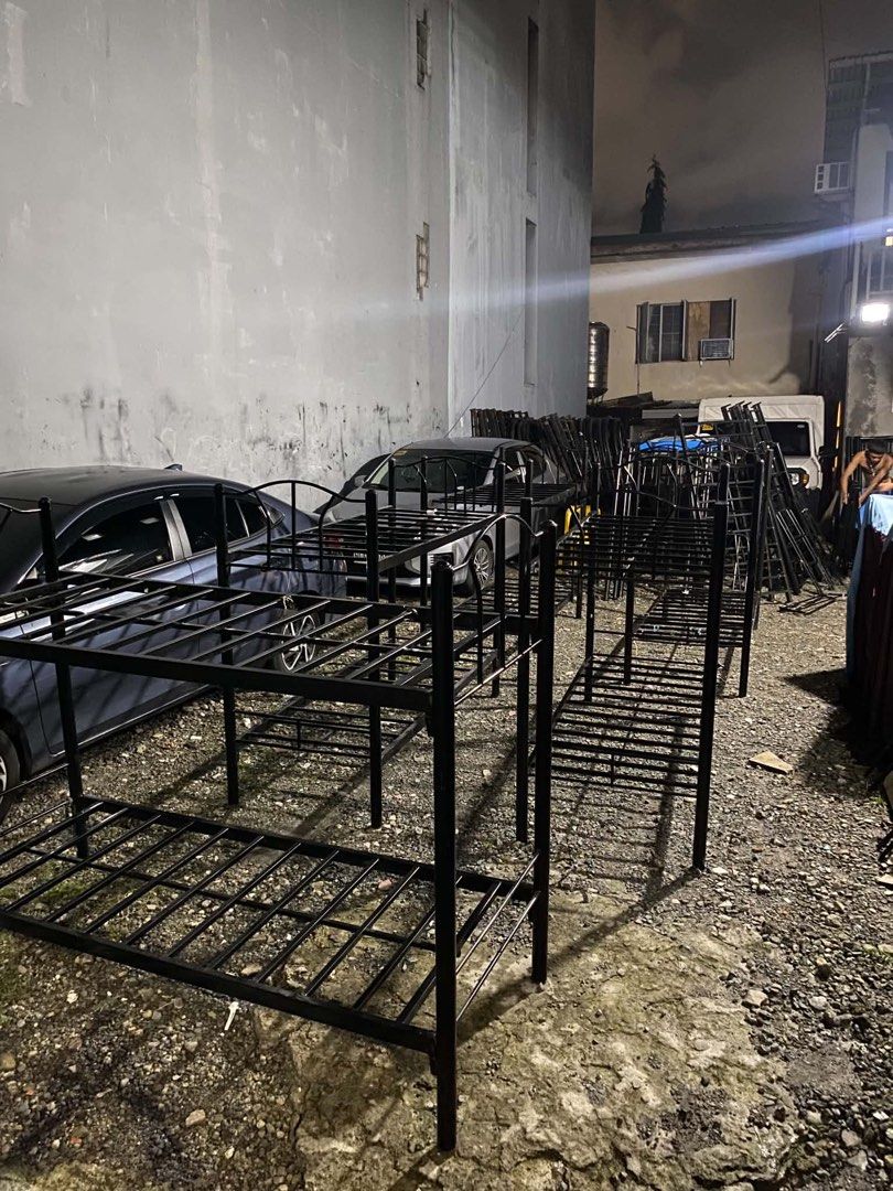Black Metal Bunk Beds Heavy Duty Dorm Frame (Category: Bed Frames & Mattresses) located in Manila. Submitted by marquezpa52205 (Listing ID 1464804790, Image 1). Description: - Heavy-duty steel construction for maximum durability - Sleek and clean black finish - Slatted frame design provides excellent mattress support - Perfect for hostels, dormitories, staff houses, and camps - Multiple units available for bulk setup - Easy to transport and ready