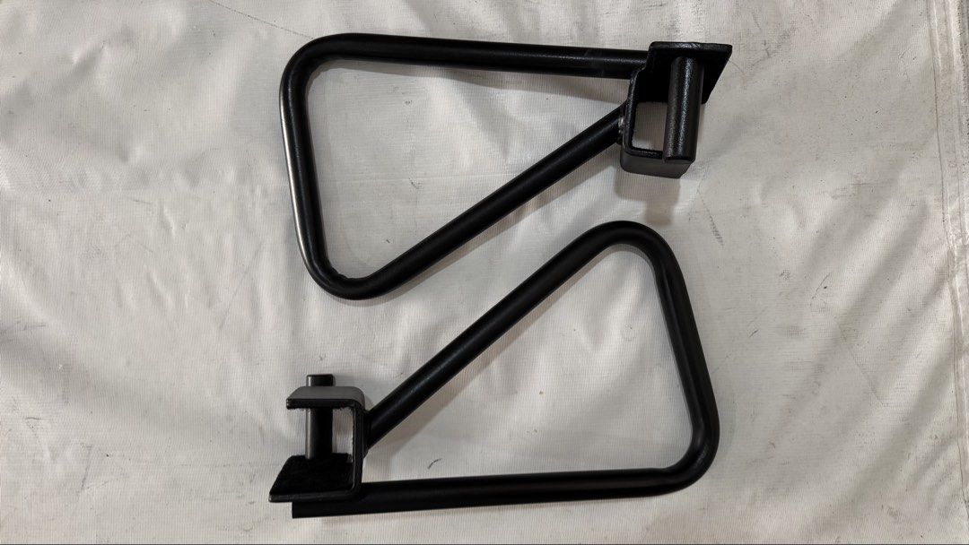 Dip bar attachment for 2.5 inch or 6.5 cm rack (Category: Weights & Dumbbells) located in Manila. Submitted by mysticstar_d67ad3_tree (Listing ID 1464891342, Image 1). Description: - Fits 2.5 inch or 6.5cm thick cage - Pair of black steel landmine handles - Triangular shape for versatile grip angles - Designed to mount easily onto standard barbell sleeves - Solid construction complete with secure mounting pins - Excellent addition for any home gy