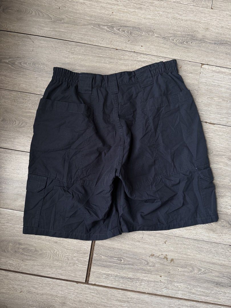 Black Tactical Cargo Shorts with Multiple Pockets (Category: Shorts) located in Legazpi City. Submitted by thefelicitythriftwear (Listing ID 1464828692, Image 3). Description: PROPPER Tactical Shorts Size 36 on tag Waistline size 34-36 on measuring tape Length 22 Rise 12.5 Leghole 13 Excellent Condition Color Rate 9.7/10 No Issue ₱650 Disclaimer: This Item of clothing is not affiliated with any of the brands posted or mentioned in this account. A