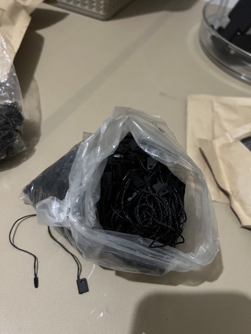 Black Tag Fasteners and Bulb Pins (Category: Craft Supplies & Tools) located in Quezon City. Submitted by styleandcomfort (Listing ID 1464944532, Image 2). Description: - Includes bulk black hang tag strings with plastic snap locks - Comes with a bonus bag of small black bulb pins - Ideal for clothing labels, boutique items, and DIY crafts - Packed securely in plastic bags - Brand new and ready for use Message me for inquiries.