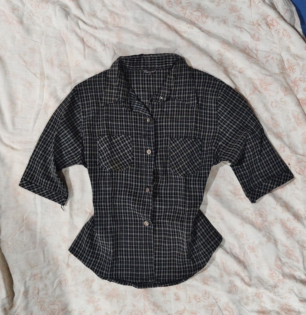 black-and-white plaid button-up shirt (Category: Blouses) located in Bulacan. Submitted by angel.decluttersx (Listing ID 1464929521, Image 1). Description: medium to large size no issue.
