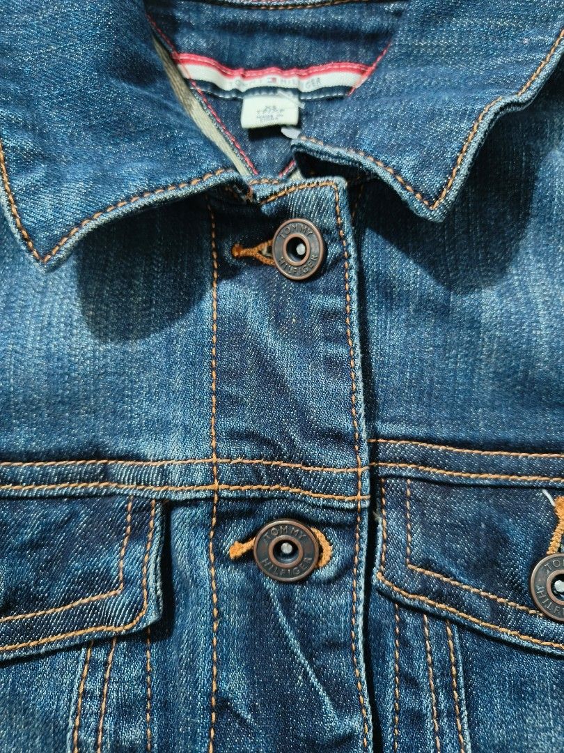 Blue Denim Jacket (Category: Coats, Jackets and Outerwear) located in Paranaque City. Submitted by vicibaltazar (Listing ID 1464810522, Image 3). Description: - Style: Light weight Classic denim jacket in dark blue wash - Details: Button-up front, classic collar, chest pockets, contrast stitching - Fit: True to size with standard denim weight and structure - Conditionin: never been used.