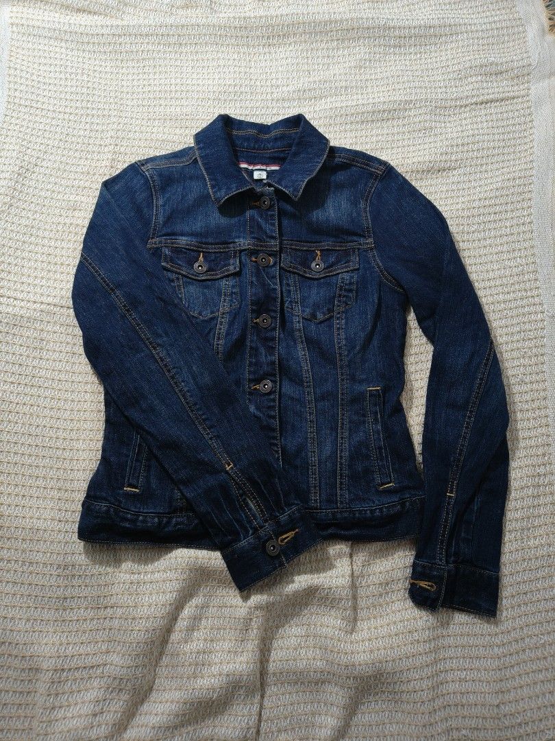Blue Denim Jacket (Category: Coats, Jackets and Outerwear) located in Paranaque City. Submitted by vicibaltazar (Listing ID 1464810522, Image 2). Description: - Style: Light weight Classic denim jacket in dark blue wash - Details: Button-up front, classic collar, chest pockets, contrast stitching - Fit: True to size with standard denim weight and structure - Conditionin: never been used.