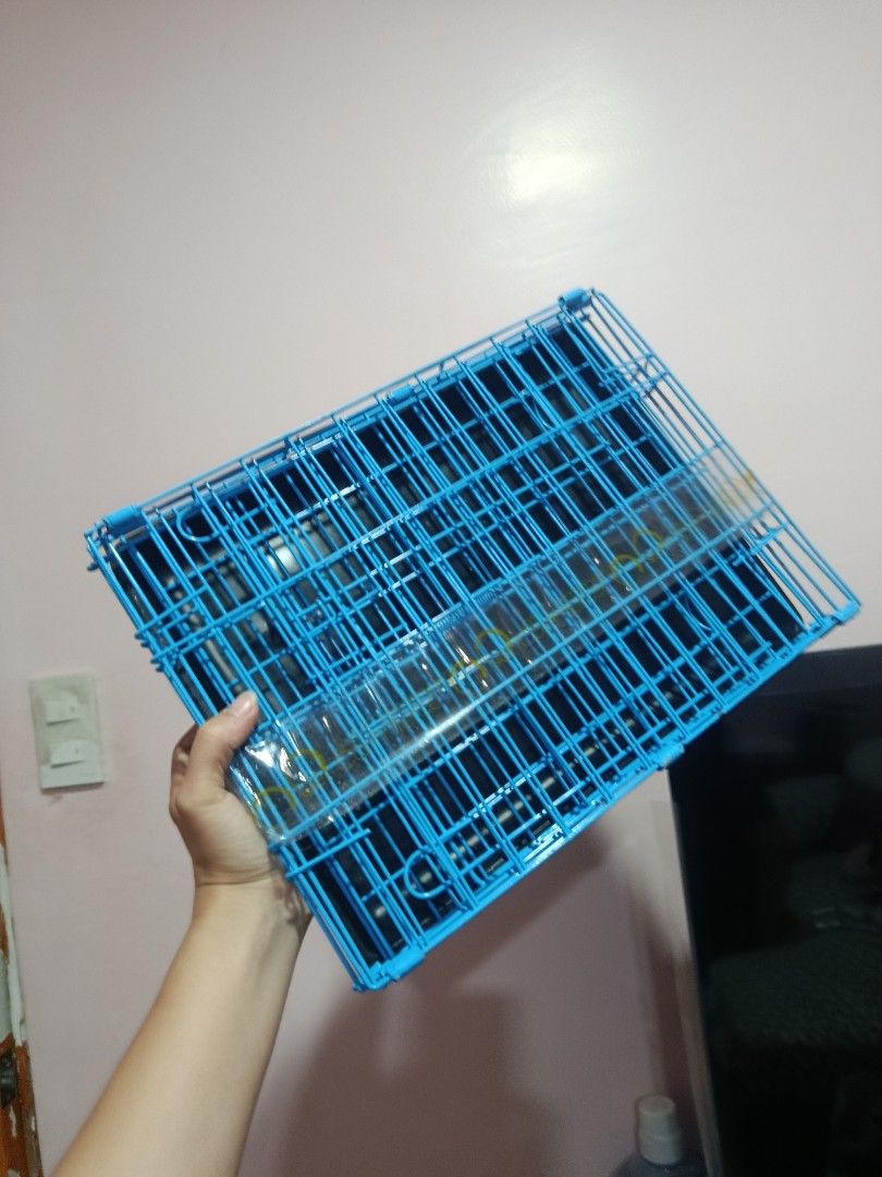 Blue foldable wire pet cage carrier for small animals (Category: Homes & Other Pet Accessories) located in Manila. Submitted by jessica02_deer (Listing ID 1464809781, Image 1). Description: DOG/CAT/RABBIT CAGE - Color: Blue - for small animals only. kasha po puppy. -Size: Small-medium. - Design: Foldable for easy storage and portability with a handy top handle - Material: Sturdy metal construction with secure latches - Includes: Removable dark tr