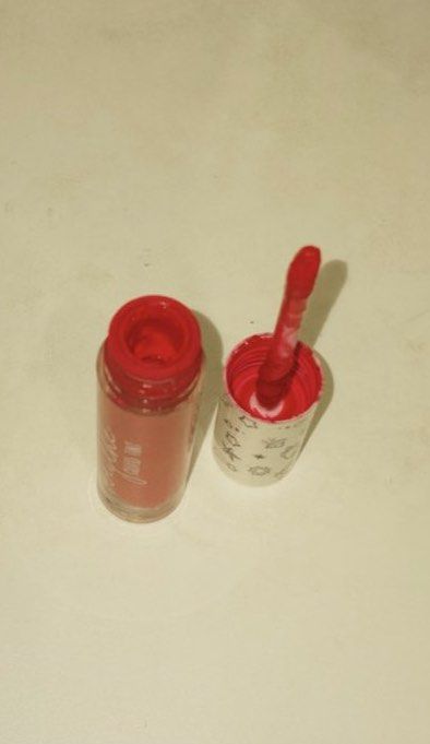 Blythe Cloud Tint - Blush/Lip stain - makeup (Category: Makeup) located in Pasig City. Submitted by nastkutu (Listing ID 1464941519, Image 2). Description: - Brand: Blythe Cloud Tint - Shade: Bright electric pink (but dont be intimidated it gives a baby pink finish) - Formula: Lightweight liquid with doe-foot applicator - Packaging: Cute space doodle cap (stars and planets) with clear tube - Condition: never had contact with the lips. But its wel