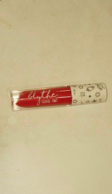 Blythe Cloud Tint - Blush/Lip stain - makeup (Category: Makeup) located in Pasig City. Submitted by nastkutu (Listing ID 1464941519, Image 1). Description: - Brand: Blythe Cloud Tint - Shade: Bright electric pink (but dont be intimidated it gives a baby pink finish) - Formula: Lightweight liquid with doe-foot applicator - Packaging: Cute space doodle cap (stars and planets) with clear tube - Condition: never had contact with the lips. But its wel
