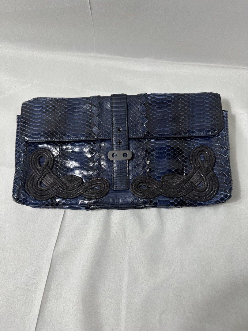 Bottega Veneta Runway Blue Python Clutch (Category: Luxury Bags & Wallets) located in Cabanglasan. Submitted by thefashiongarage.co (Listing ID 1464805067, Image 2). Description: Title - Bottega Veneta Model/Name - Runway Blue Python 2012 Fall Collection Size on Tag - Conditiion - Excellent Condition with no issue Dimension (WxLxH) - 13x7 Inches Category- Clutch/Archival/Luxury Fitting - Made in - Italy Material - Python Leather Color - Blue Desi