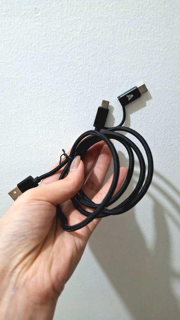 Braided Multi-Connector Charging Cable USB Type-C (Category: Chargers & Cables) located in Quezon City. Submitted by tinylittlecorner (Listing ID 1464853259, Image 1). Description: - Color: Black - Exterior: Durable woven braided design - Connectors: Standard USB-A, USB Type-C, and an extra split connector P50 each.