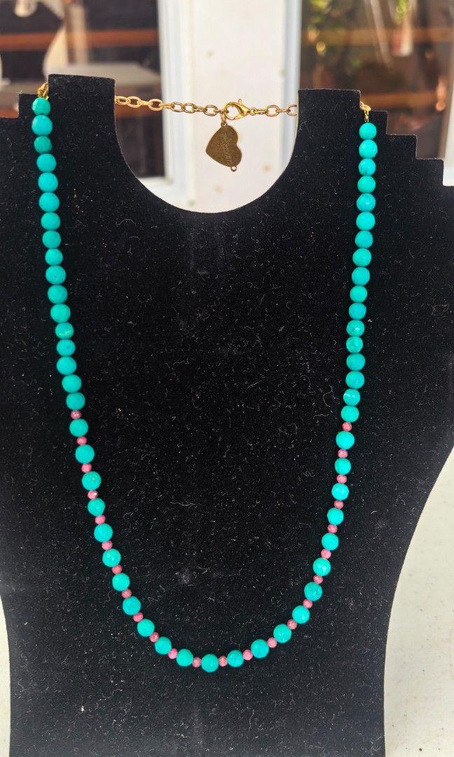 Brand New turquoise and ruby with stainless chain (Category: Necklaces) located in Tuguegarao City. Submitted by zenphoenix-7ad615 (Listing ID 1464797144, Image 1). Description: Brand new Adjustable necklace.