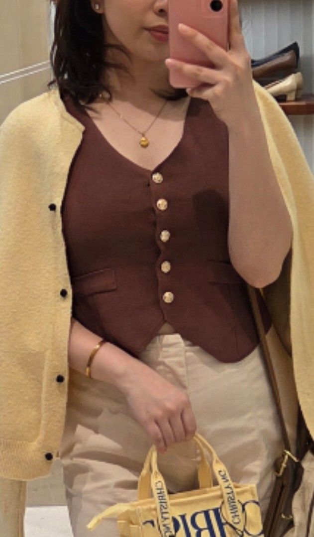 Brown Knitted Top Vest (Category: Sleeveless) located in Quezon City. Submitted by pwinx (Listing ID 1464792643, Image 1). Description: - Used once - Knitted - Stretchable - S-M size - Semi-cropped .