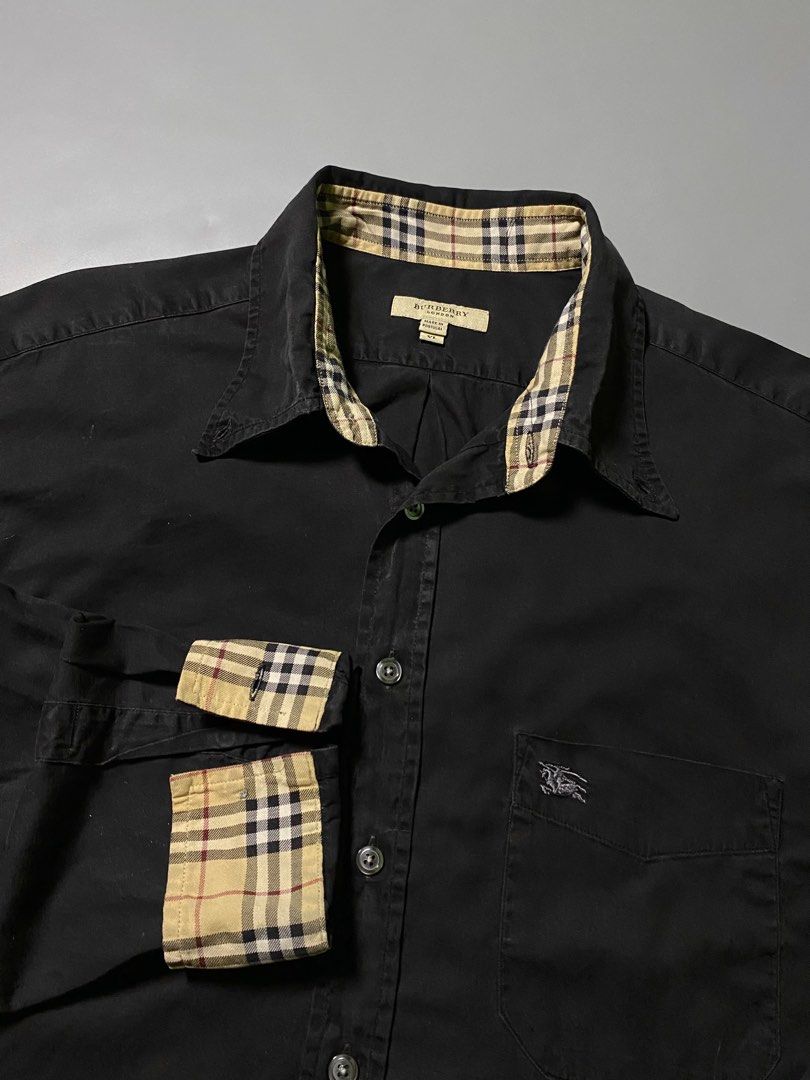 Burberry Black Button Down Polo ( Like New ) (Category: Formal Shirts) located in Las Pinas. Submitted by reluxearchive (Listing ID 1464938024, Image 1). Description: Measurements ( Inches ) Width : 23 Length : 28 Condition : 10/10 Color Rate : 10/10 Flaws / Issues : None Price : 2000 📍100 % Authentic 📍What you see is what you get 🚚 Lbc | J&t | Lalamove | Dhl.
