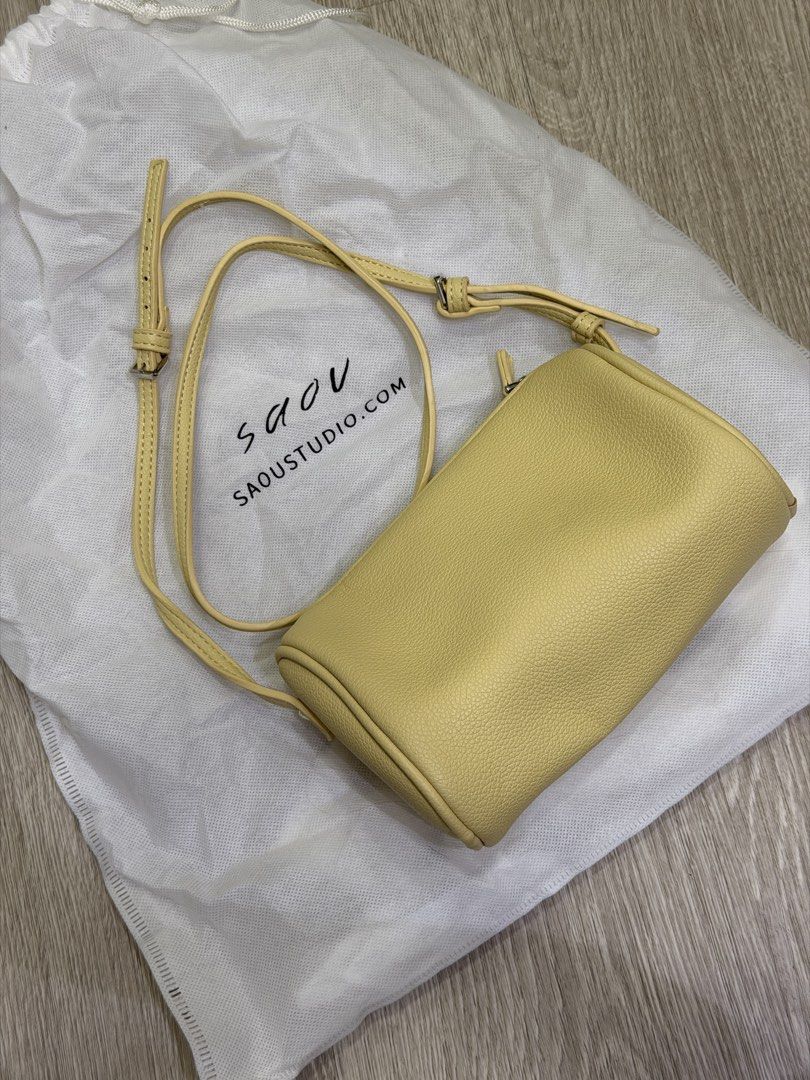 Butter yellow crossbody bag (Category: Cross-body Bags) located in Taguig. Submitted by darjaromanova (Listing ID 1464799015, Image 2). Description: Small butter-yellow bag from a Singaporean brand. Used only once for a photo shoot. Selling because I’m clearing out my wardrobe..
