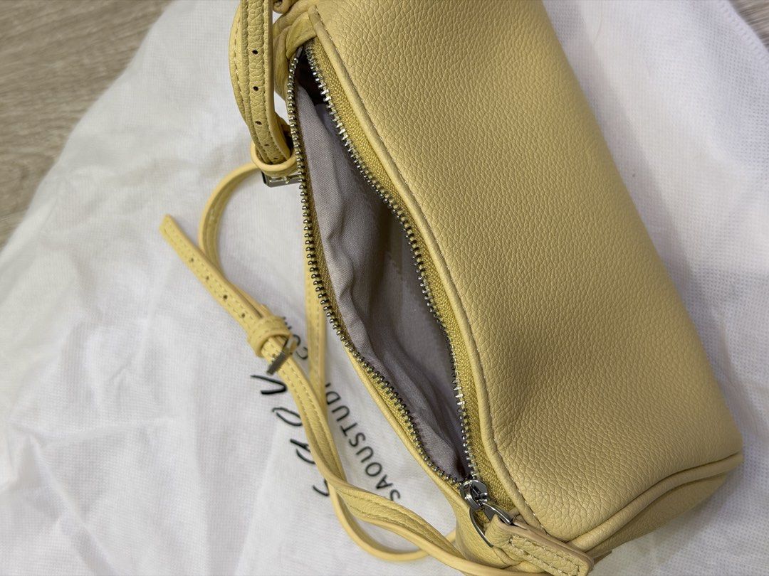 Butter yellow crossbody bag (Category: Cross-body Bags) located in Taguig. Submitted by darjaromanova (Listing ID 1464799015, Image 3). Description: Small butter-yellow bag from a Singaporean brand. Used only once for a photo shoot. Selling because I’m clearing out my wardrobe..