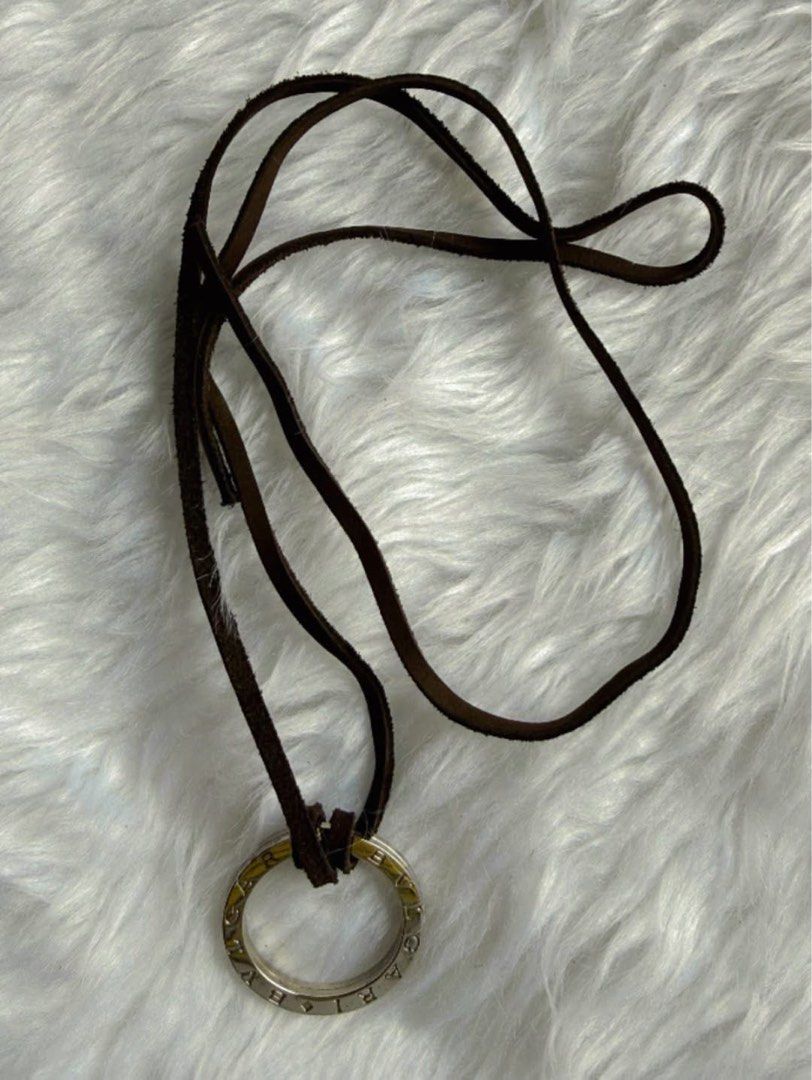 Bv/gari silver ring pendant (Category: Necklaces) located in Manila. Submitted by annafinds (Listing ID 1464876604, Image 3). Description: A Bv/gari silver ring pendant on a dark brown leather cord necklace. ₱7,500 Open for layaway. Disclaimer: We are not affiliated, associated, authorized, endorsed by or in any way officially connected with any other company or luxury brand. All copyrights are reserved to the original brand..