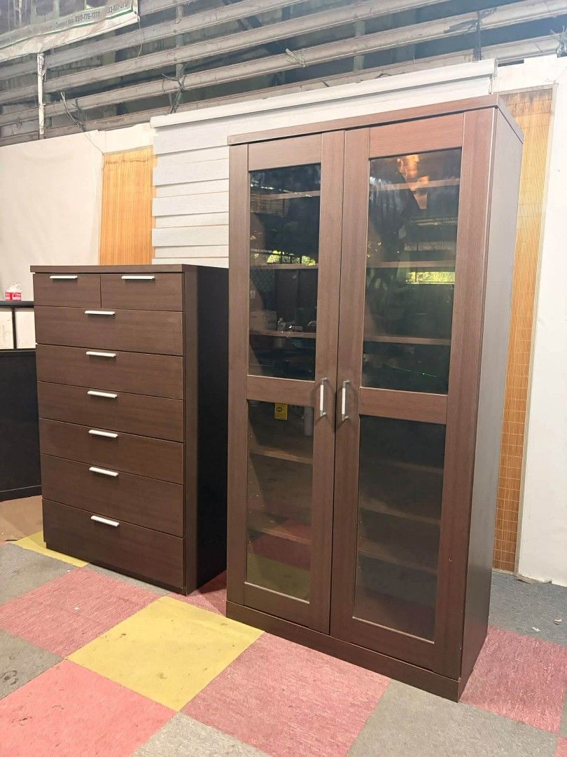 Cabinet (Category: Shelves, Cabinets & Racks) located in Meycauayan. Submitted by marygracecasimiro (Listing ID 1464816404, Image 3). Description: Modern Bookcase & Chest Drawer Set Glass Display Cabinet / Bookcase with Sliding Shelf Adjustable & Removable Shelves, MAKINIS!!! 36L x 18W x 71H inches Price : 11,500 ✅💜💜 Moder Chest Drawer Solid Wood Drawers, MAKINIS!!! Drawers with Railings for Easy Open & Close 35L x 16W x 54H inches Price : 10k 