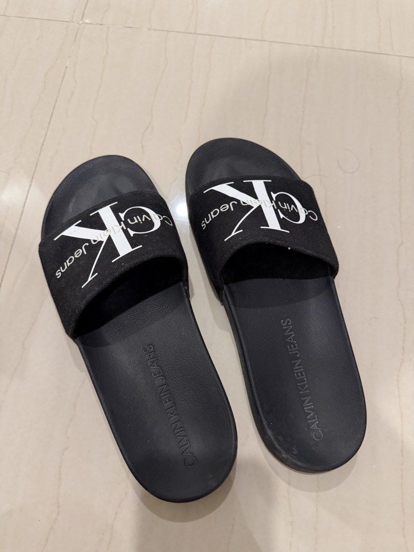 Calvin Klein Slides (Category: Sneakers) located in Malasiqui. Submitted by jeffrey89ers (Listing ID 1464891427, Image 2). Description: Bought in Abu Dhabi, UAE Free shipping Genuine Original from CK store.