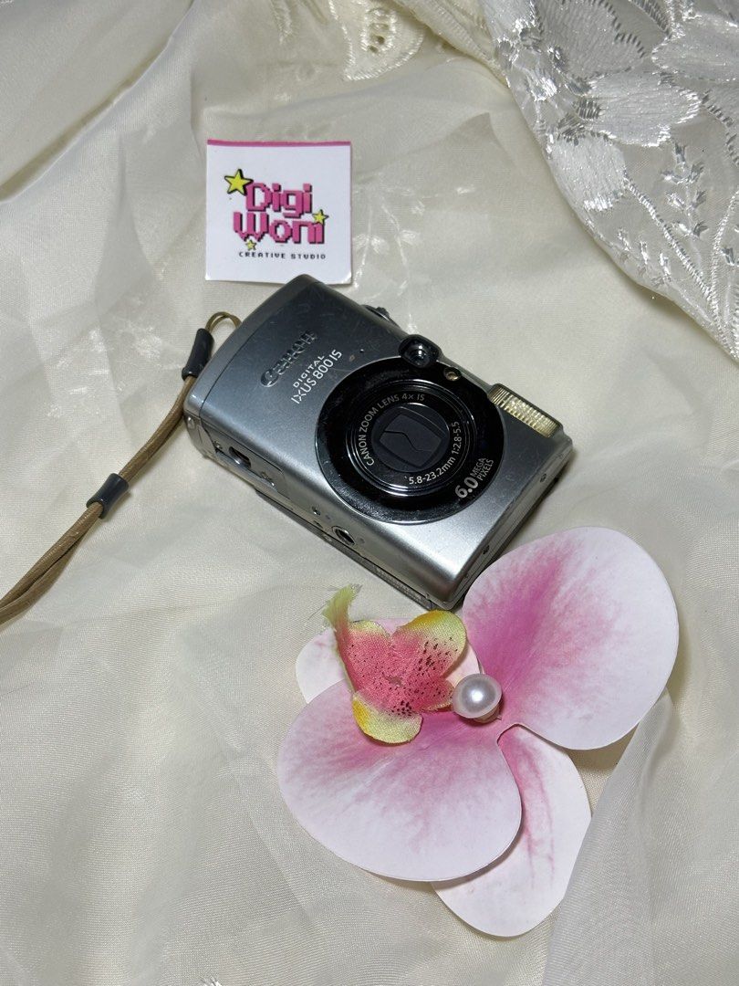 Canon Digital Ixus 800 (Category: Cameras) located in Tiaong. Submitted by digi.woni (Listing ID 1464913857, Image 1). Description: 📸 Canon Digital Ixus 800 🖤 💸 ₱ 3,299 ✅ Condition • 100% Tested & Fully Working • Autofocus & Zoom working • Flash working • Buttons & LCD fully functional ‼️Issue - lcd wrap - focus issue (need naka zoom in to focus) 📦 Inclusions - camera unit - battery - charger - sd card - beaded strap - pouch - FREE nose stick
