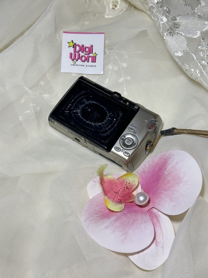 Canon Digital Ixus 800 (Category: Cameras) located in Tiaong. Submitted by digi.woni (Listing ID 1464913857, Image 2). Description: 📸 Canon Digital Ixus 800 🖤 💸 ₱ 3,299 ✅ Condition • 100% Tested & Fully Working • Autofocus & Zoom working • Flash working • Buttons & LCD fully functional ‼️Issue - lcd wrap - focus issue (need naka zoom in to focus) 📦 Inclusions - camera unit - battery - charger - sd card - beaded strap - pouch - FREE nose stick
