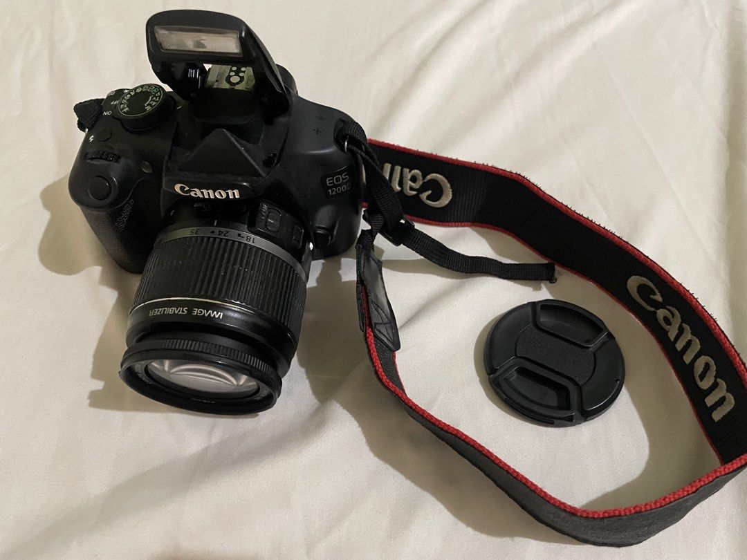 canon eos 1200d dslr (Category: Cameras) located in Manila. Submitted by mariali_ (Listing ID 1464948706, Image 2). Description: CANON EOS 1200D Still working and in a good condition. Been using it for random photoshoots lang and di rin lagi nagagamit. Inclusions: - battery and charger - lens cover - memory card to iphone transfer chord (left the camera bag sa province that’s why its not included). Condition: - all functions working - lens has ti