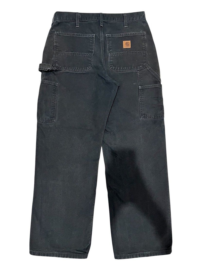 Carhartt B11 BLK Carpenter Pants - 32x30 (Category: Jeans) located in Malaybalay. Submitted by tapiocasthrift (Listing ID 1464862899, Image 1). Description: Size: 32x30 Dimes: 32 Waist x 42 Length HEM: 9 Thigh: 12.5 Color rate: 8.8/10 Very Good condition Issue Issue: signs of usage, minor distress hem slight fade.