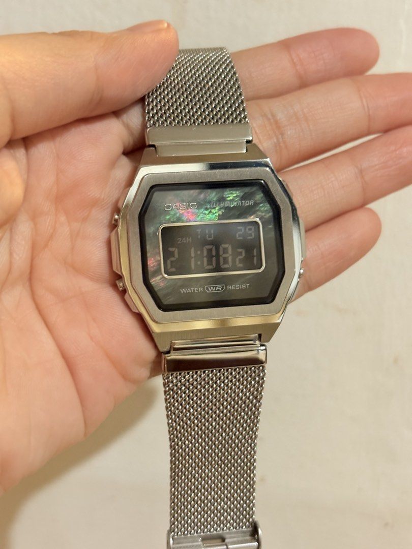 Casio A1000 Stainless Steel Digital Watch (Category: Men's Watches) located in Manila. Submitted by strawbbmilkshake (Listing ID 1464894571, Image 1). Description: - Model: Casio A1000 Digital Watch - Material: Premium stainless steel build with a comfortable mesh strap - Dial: Elegant mother-of-pearl face with time and date display - Features: Water-resistant construction for daily wear - Details: Clean metal finish with module number 3479 and o