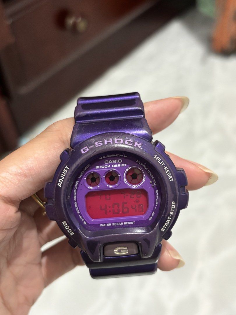 Casio G-Shock DW-6900CC Purple Digital Watch (Category: Men's Watches) located in Manila. Submitted by amphitrite_ (Listing ID 1464781039, Image 1). Description: - Authentic Casio G-Shock digital watch - Eye-catching purple resin case and strap with standard buckle - Bold red digital display dial featuring triple graph eyes - Water resistant up to 20 bar (200M) - Stainless steel backplate secured with four screws - Fully functioning buttons (adju