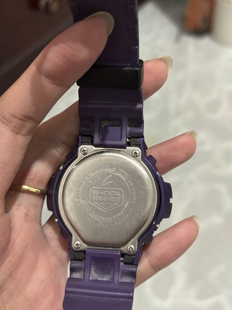 Casio G-Shock DW-6900CC Purple Digital Watch (Category: Men's Watches) located in Manila. Submitted by amphitrite_ (Listing ID 1464781039, Image 2). Description: - Authentic Casio G-Shock digital watch - Eye-catching purple resin case and strap with standard buckle - Bold red digital display dial featuring triple graph eyes - Water resistant up to 20 bar (200M) - Stainless steel backplate secured with four screws - Fully functioning buttons (adju