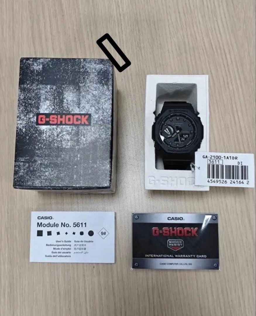 Casio G-Shock GA-2100-1A1DR Watch (Category: Men's Watches) located in Muntinlupa City. Submitted by carley62514 (Listing ID 1464809272, Image 2). Description: - Brand: Casio G-Shock - Model: GA-2100-1A1DR (All-Black / Casioak) - Design: Iconic octagonal bezel with analog hands and digital display - Module: 5611 - Inclusion: Complete original packaging, box, user manual booklet, and international warranty card - Condition: Used 2x - MOP: GCash / 