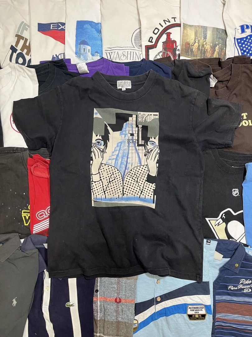 Cav Empt Graphic Tee Black XL (Category: Tshirts & Polo Shirts ) located in Baao. Submitted by plainclothesdept (Listing ID 1464780181, Image 1). Description: Cav Empt Two Face Tee width - 22 in. length- 27 in. no flaws - Brand: Cav Empt - Size: XL - Origin: Made in Japan - Details: Graphic print on front and back with text, branding printed on both shoulders at the back, and collar tag - Condition/Finish: Heavy vintage wash fade - Perfect for: S