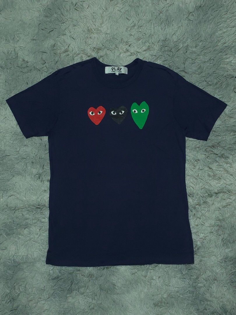 CDG PLAY (Category: Tshirts & Polo Shirts ) located in Abulug. Submitted by humanwhosellthings (Listing ID 1464896684, Image 1). Description: CDG PLÀŸ ✅️Size: Large on tag fit to Medium ✅️Dimes: 19.5W x 28L ✅Condition: Excellent ✅Issue: None,minimal hairline sa banda mata lang ✅Color Rate: 9.8/10.