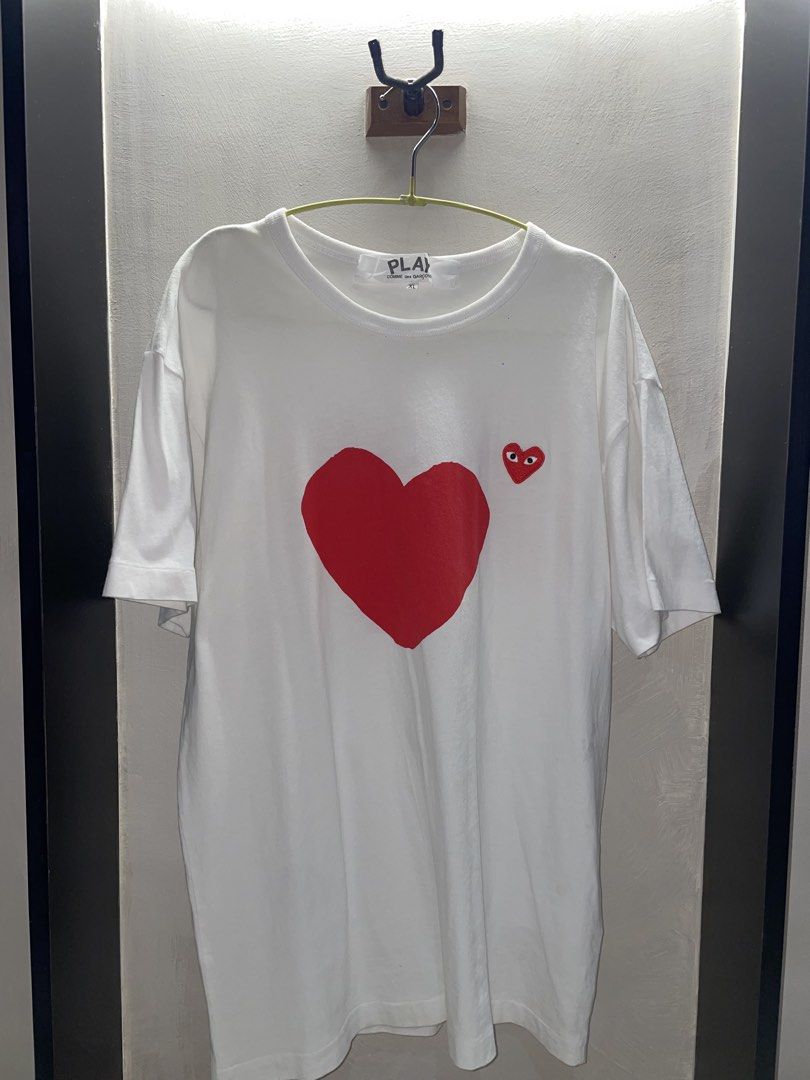 CDG Shirt (Category: Tshirts & Polo Shirts ) located in Manila. Submitted by dominicx_ (Listing ID 1464949147, Image 1). Description: CDG Shirt (STEAL PRICE) Size: XL Lightly used. RFS: Decluttering.