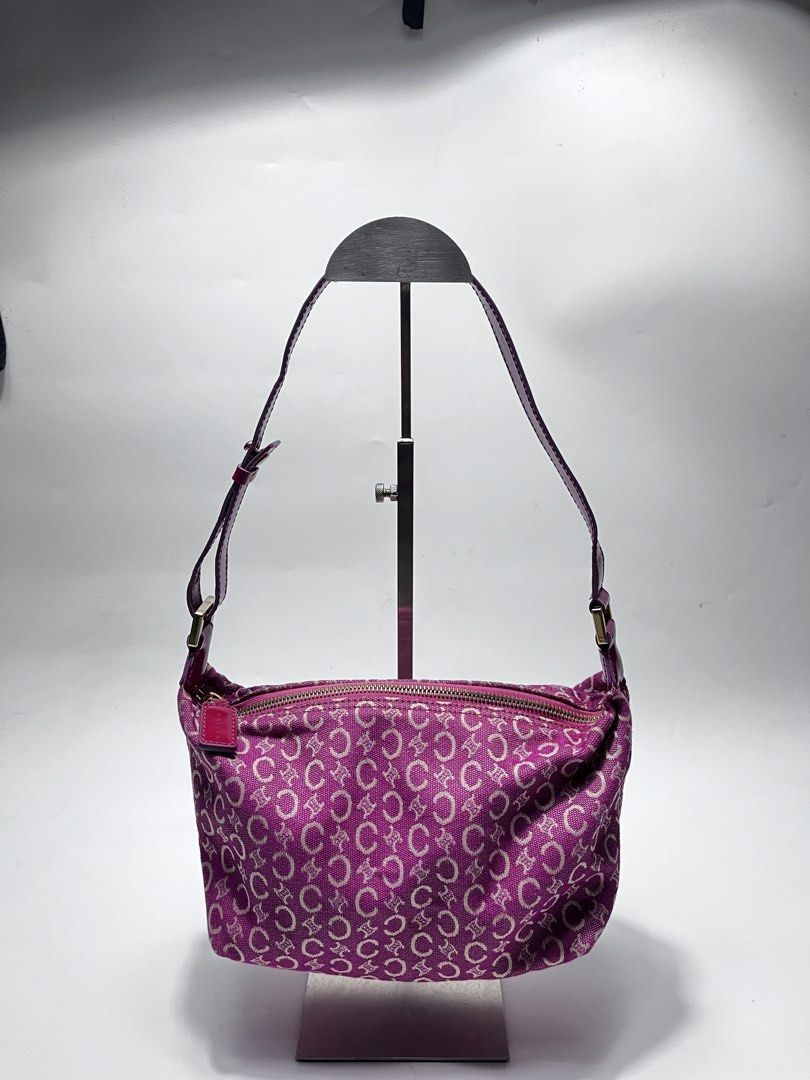 Celine Pink C Macadam Canvas Shoulder Bag (Category: Luxury Bags & Wallets) located in Iloilo. Submitted by fromthebins.ilo2 (Listing ID 1464949263, Image 1). Description: - Brand: Celine - Style: Shoulder Bag - Material: C Macadam canvas with patent leather trim - Color: Vibrant magenta / dark pink - Closure: Zip top - Interior: Zipped pocket with Celine leather tag - Origin: Made in Italy - Authenticity Code: MC00/3 (stamped on reverse of brand