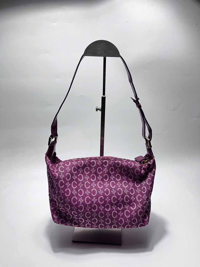 Celine Pink C Macadam Canvas Shoulder Bag (Category: Luxury Bags & Wallets) located in Iloilo. Submitted by fromthebins.ilo2 (Listing ID 1464949263, Image 2). Description: - Brand: Celine - Style: Shoulder Bag - Material: C Macadam canvas with patent leather trim - Color: Vibrant magenta / dark pink - Closure: Zip top - Interior: Zipped pocket with Celine leather tag - Origin: Made in Italy - Authenticity Code: MC00/3 (stamped on reverse of brand