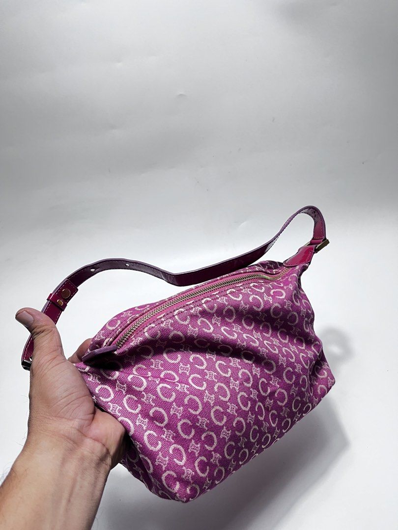 Celine Pink C Macadam Canvas Shoulder Bag (Category: Luxury Bags & Wallets) located in Iloilo. Submitted by fromthebins.ilo2 (Listing ID 1464949263, Image 3). Description: - Brand: Celine - Style: Shoulder Bag - Material: C Macadam canvas with patent leather trim - Color: Vibrant magenta / dark pink - Closure: Zip top - Interior: Zipped pocket with Celine leather tag - Origin: Made in Italy - Authenticity Code: MC00/3 (stamped on reverse of brand