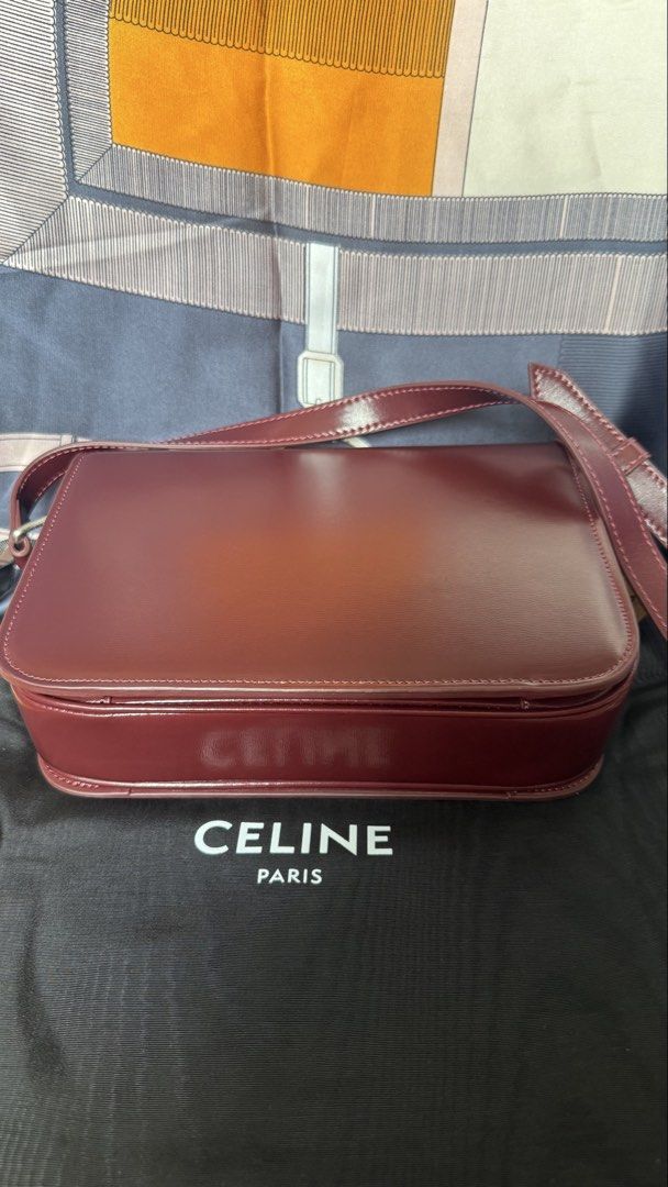 Celine Triomphe body bag Oxblood (Category: Cross-body Bags) located in Manila. Submitted by prelovedrepubliq (Listing ID 1464846041, Image 3). Description: Celine Triomphe Body bag in oxblood Comes with dustbag only Genuine leather Not Guarranteed Auth.