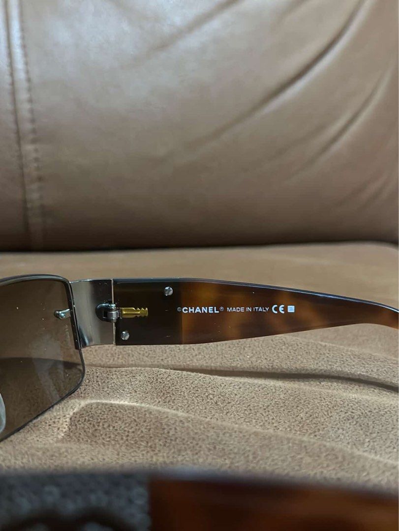 Chanel 4117-B Rhinestone Tortoiseshell Sunglasses (Category: Sunglasses & Eyewear) located in Manila. Submitted by _prelovedbynotcarls (Listing ID 1464823425, Image 3). Description: - Brand: Chanel - Model: 4117-B c.275/13 (Y2K vintage classic) - Frame: Tortoiseshell arms with sparkling rhinestone CC logo - Lenses: Gradient brown - Size: 62-16 125 (stamped on inner temple) - Origin: Made in Italy - Condition: Great overall condition.