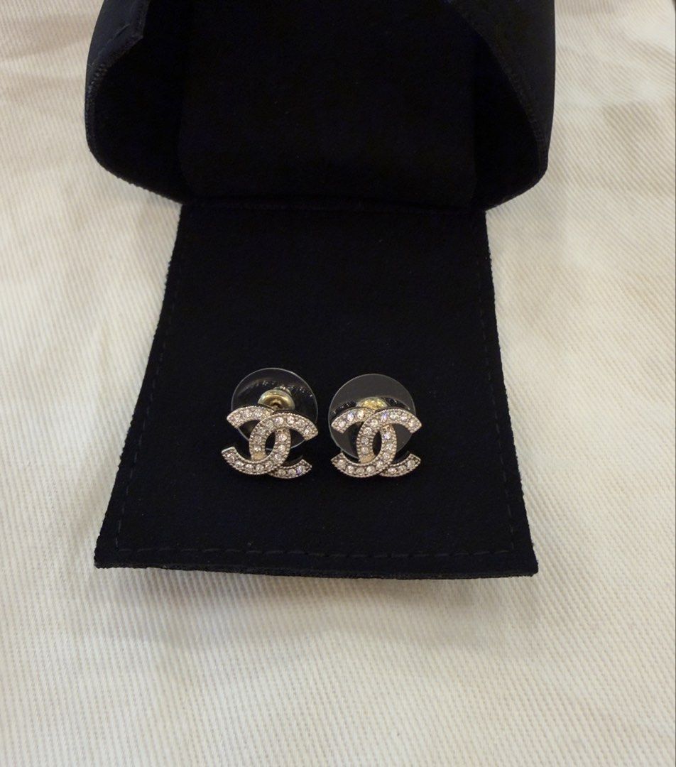Chanel CC Crystal Stud Earrings (Category: Earrings) located in Angat. Submitted by shopmyclosetbykris (Listing ID 1464851087, Image 3). Description: Purchased from Komehyo Japan (2022) Condition: Like new, no any flaw to mention Kept unused With box Will send more actual photos upon request Guranteed Auth, has chanel serial markings at the back Has Cert of authentication 15,500 ! LP posted! Location: Baliwag Bulacan Meet ups within Bulacan .