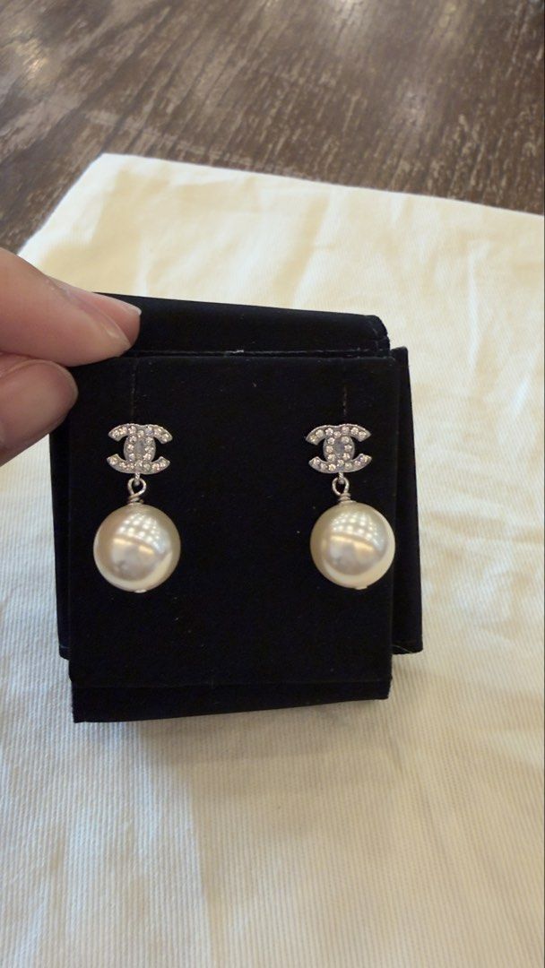 Chanel CC Pearl Drop Earrings (Category: Earrings) located in Angat. Submitted by shopmyclosetbykris (Listing ID 1464847952, Image 2). Description: Purchased from Komehyo Japan (2022) Condition: Like new, no any flaw to mention Kept unused With box Will send more actual photos upon request Guranteed Auth, has chanel serial markings at the back Has Cert of authentication 15,500! LP posted! Location: Baliwag Bulacan Meet ups within Bulacan .